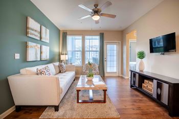 A living room with a couch and a coffee table